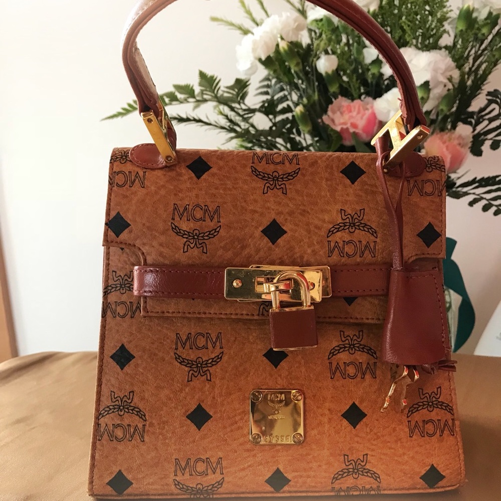 MCM lock & key mini handbag in Cognac